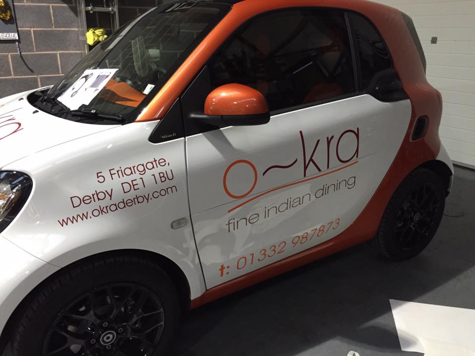 o~kra Smart Car Signage